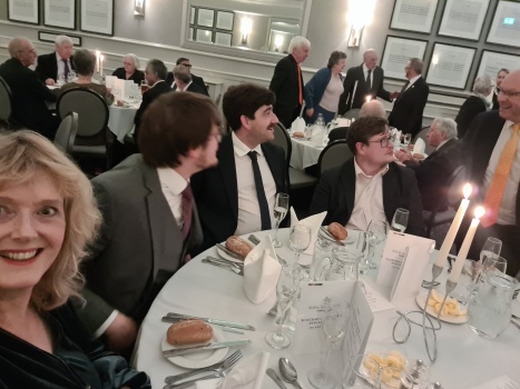 Photo of people enjoying dinner